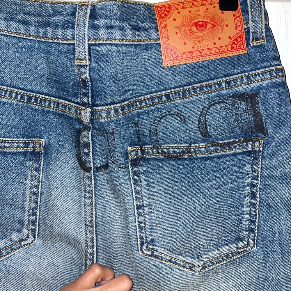 SOLD Gucci stamped straight jeans